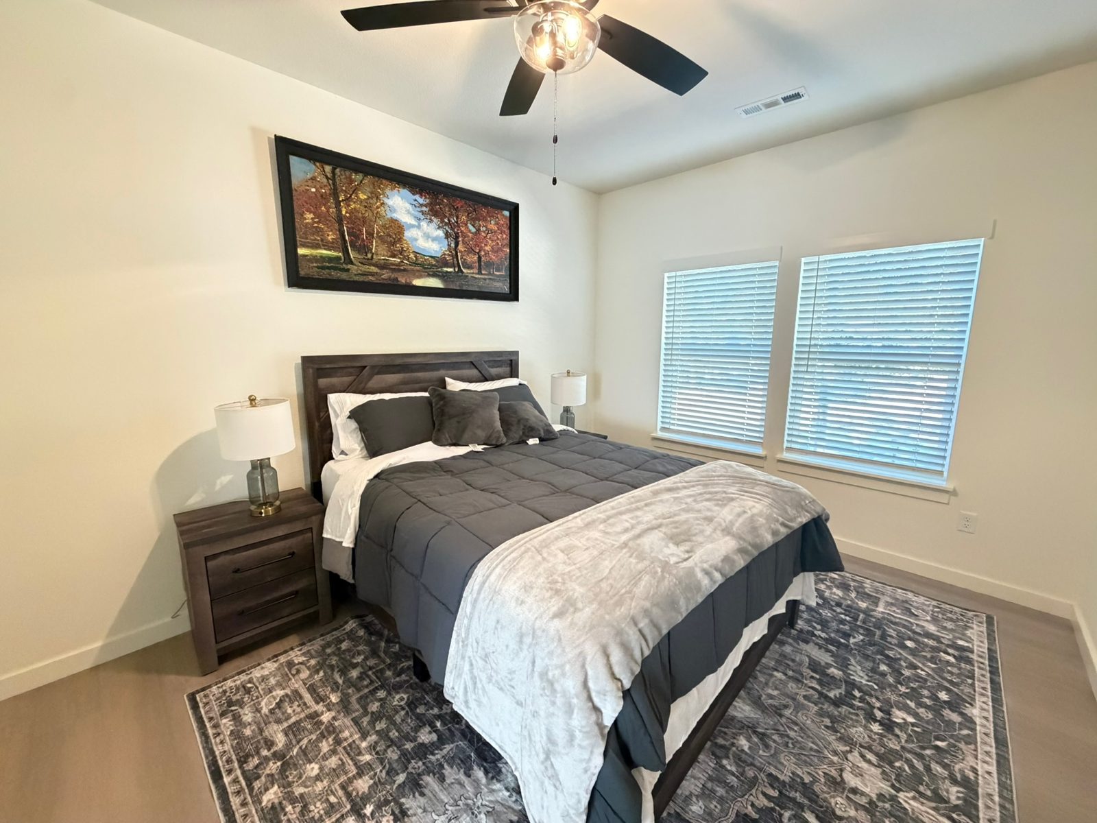 Bedroom with gray bedding